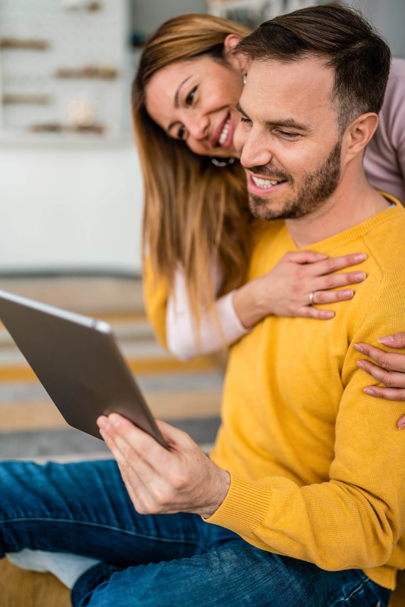 young-couple-in-love-at-home-websurfing-on-internet-1.jpg